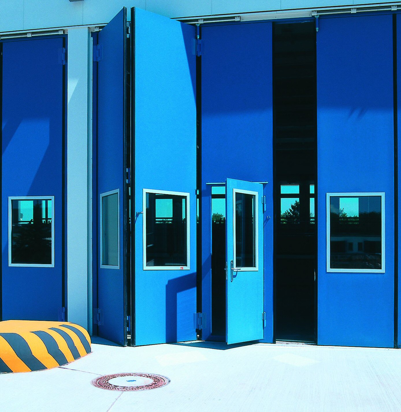 industrial folding doors in India by NIHVA